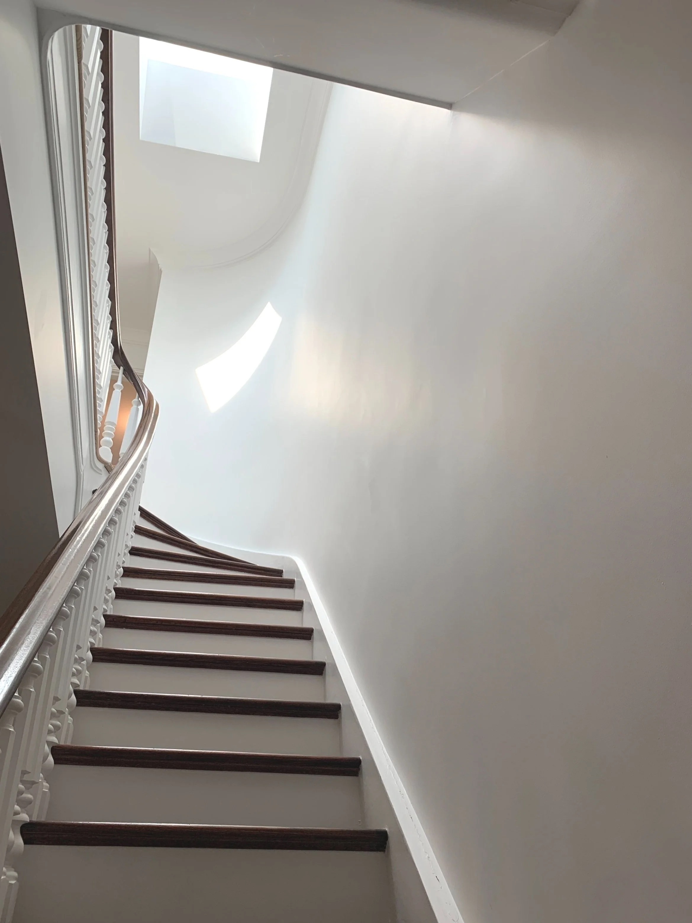 A creative hallway vignette photographed by Hallie Goodman