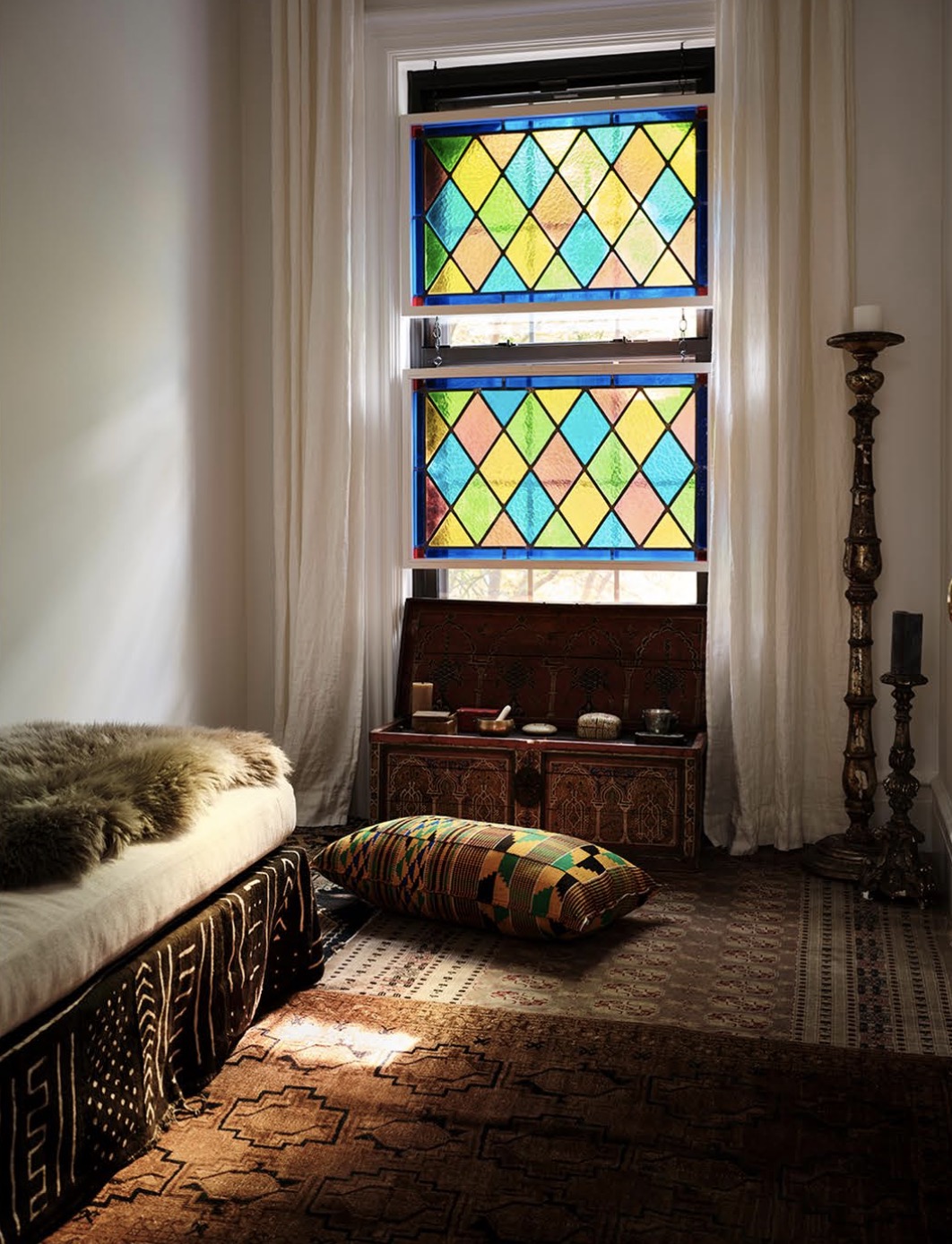 A soulful living space layered with art and vintage