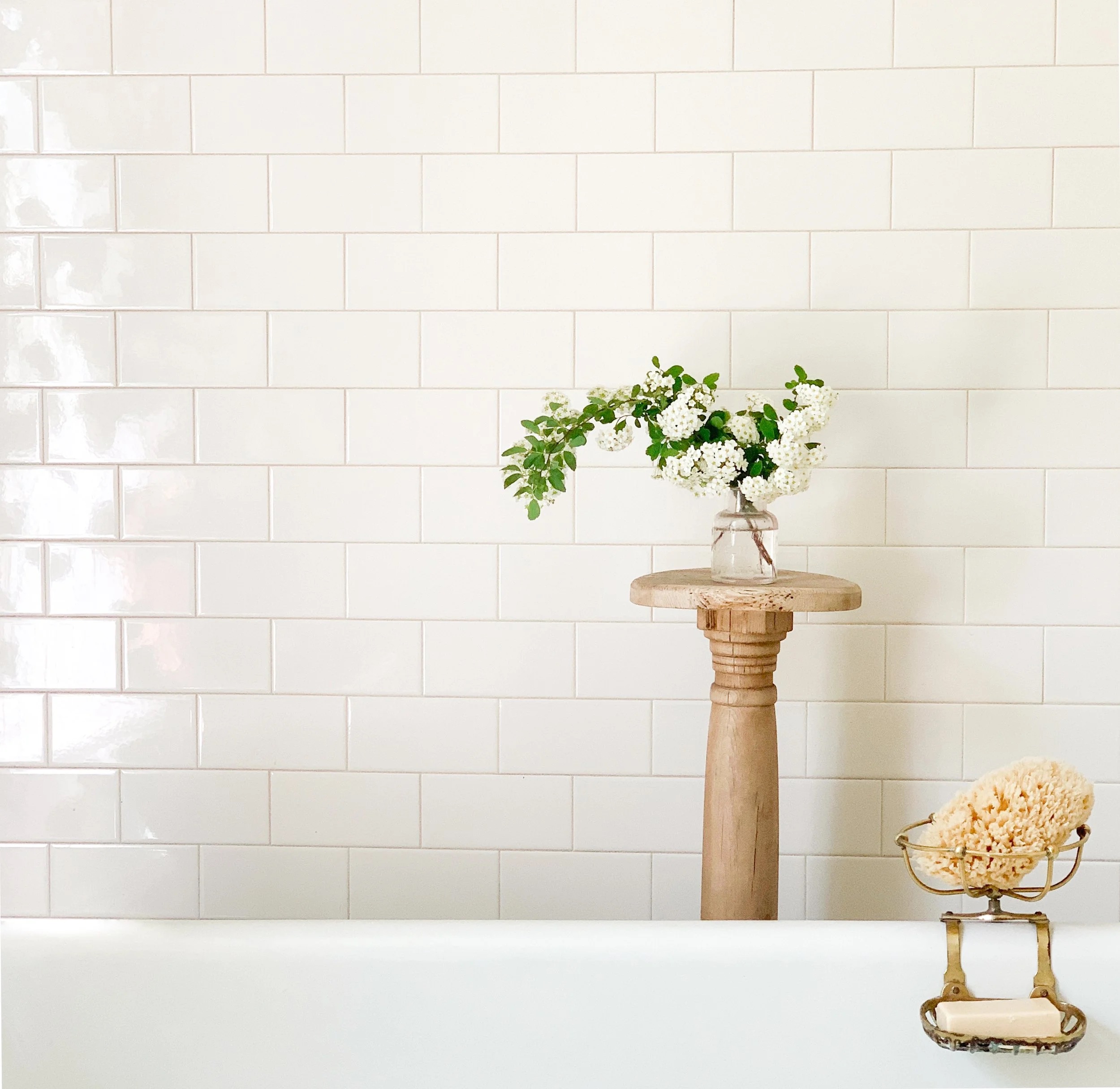 A timeless bathroom vignette photographed by Hallie Goodman